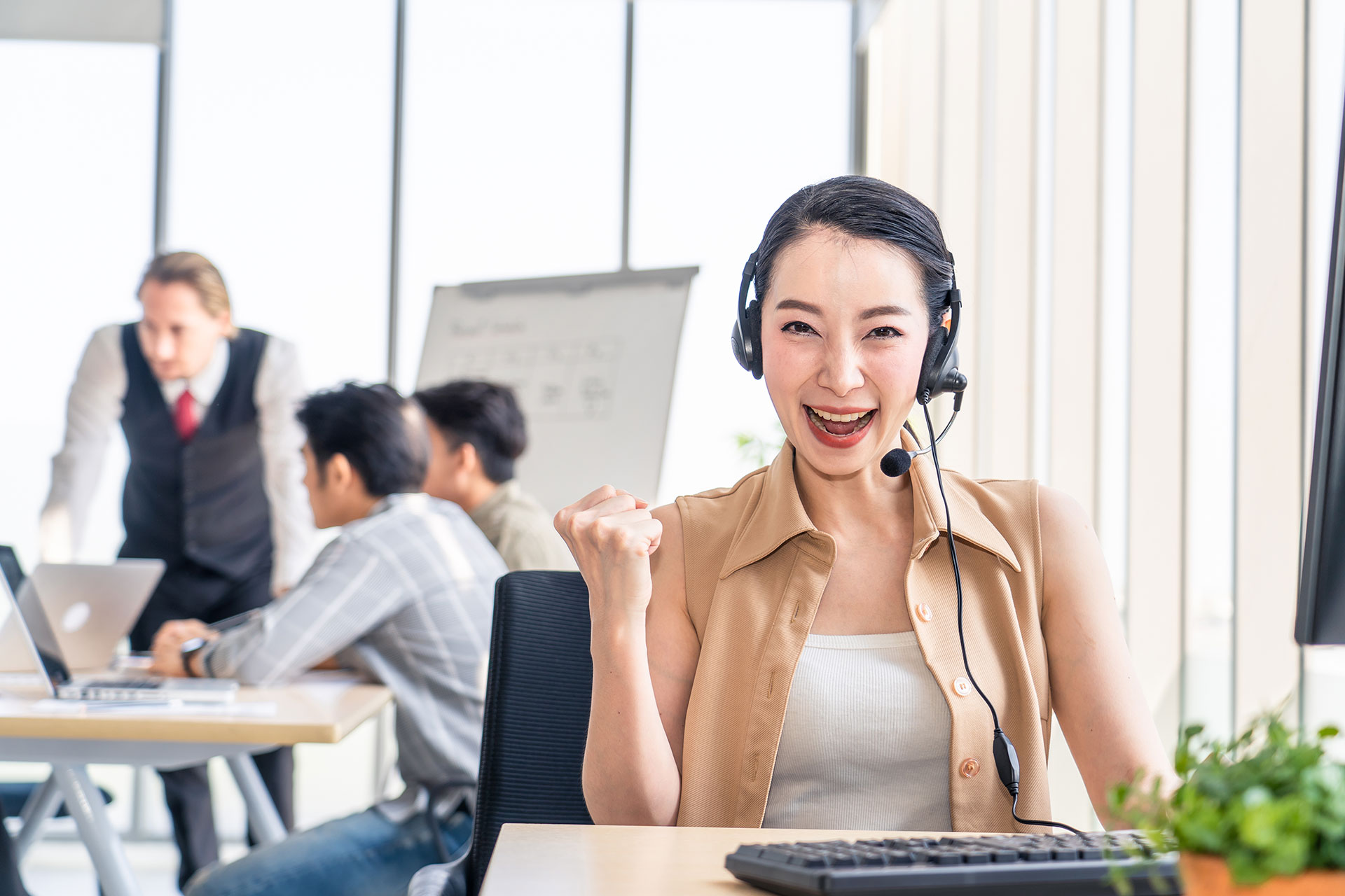 asian-young-beautiful-call-center-work-with-smile.jpg